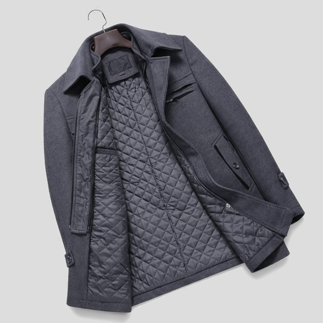 Full length shot of a men's sophisticated tailored long winter coat, ideal for elegant cold weather fashion.