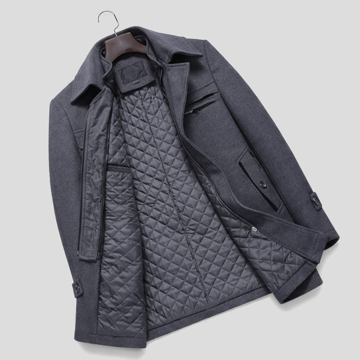 Full length shot of a men's sophisticated tailored long winter coat, ideal for elegant cold weather fashion.