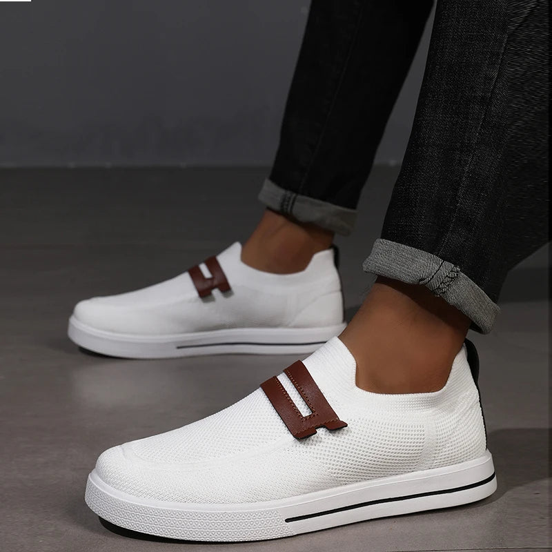 Black men's dress loafers, sophisticated slip-on footwear for style & comfort.