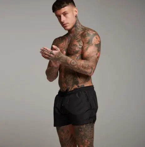 Men's tan-through swim shorts in tan for seamless sunbathing, quick-dry & comfortable men's beachwear.