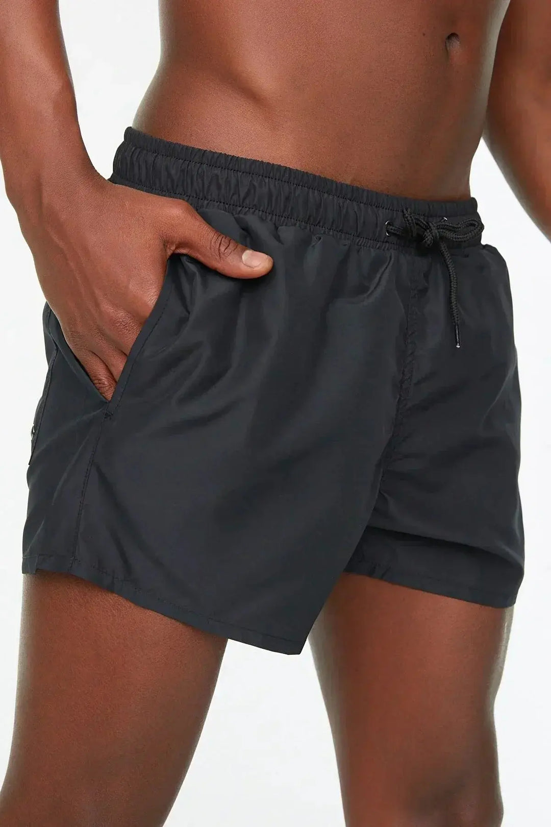 Tan men's tan-through swim shorts, opaque & quick-dry for ultimate sunbathing and comfortable summer beachwear.