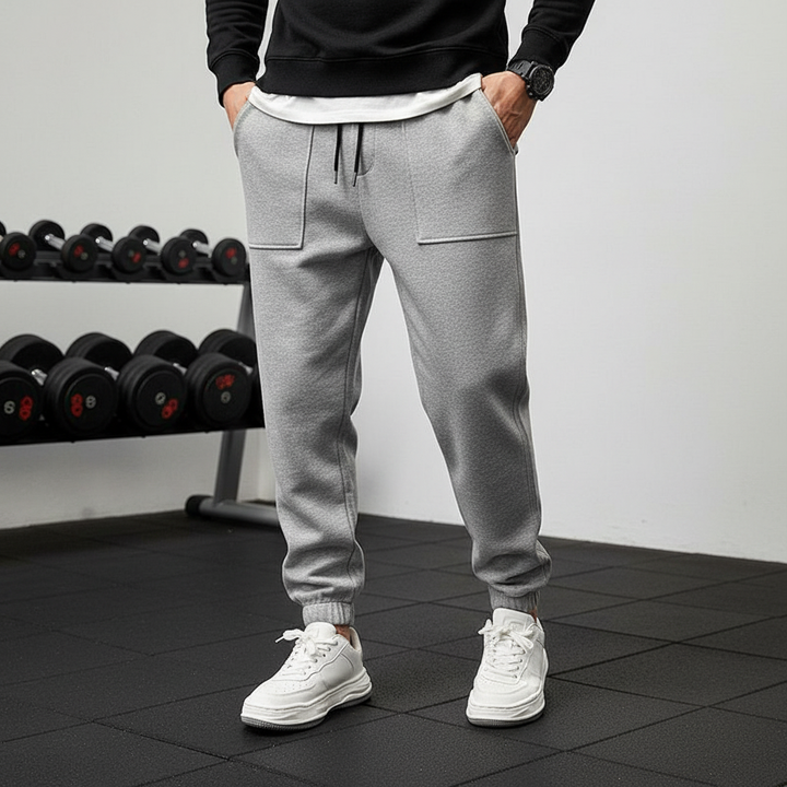 Men's Tanner athletic performance pants with elastic waistband for comfortable workouts.