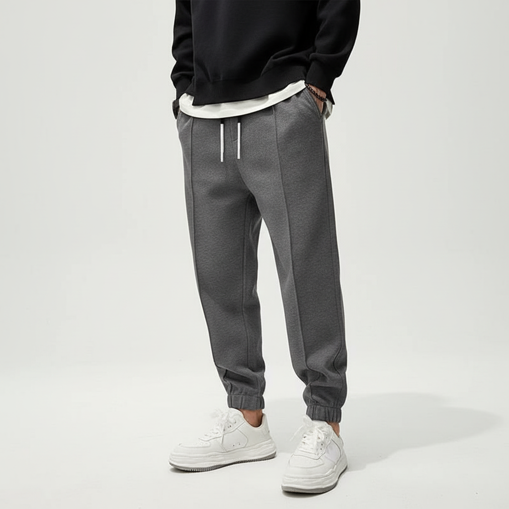 Tanner men's athletic performance pants; elastic waistband ensures a secure, comfortable fit.