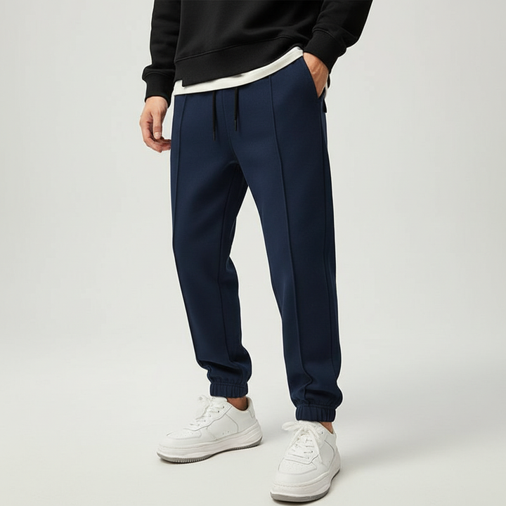 Stylish men's Tanner activewear pants with elastic waist, great for sport and comfort.