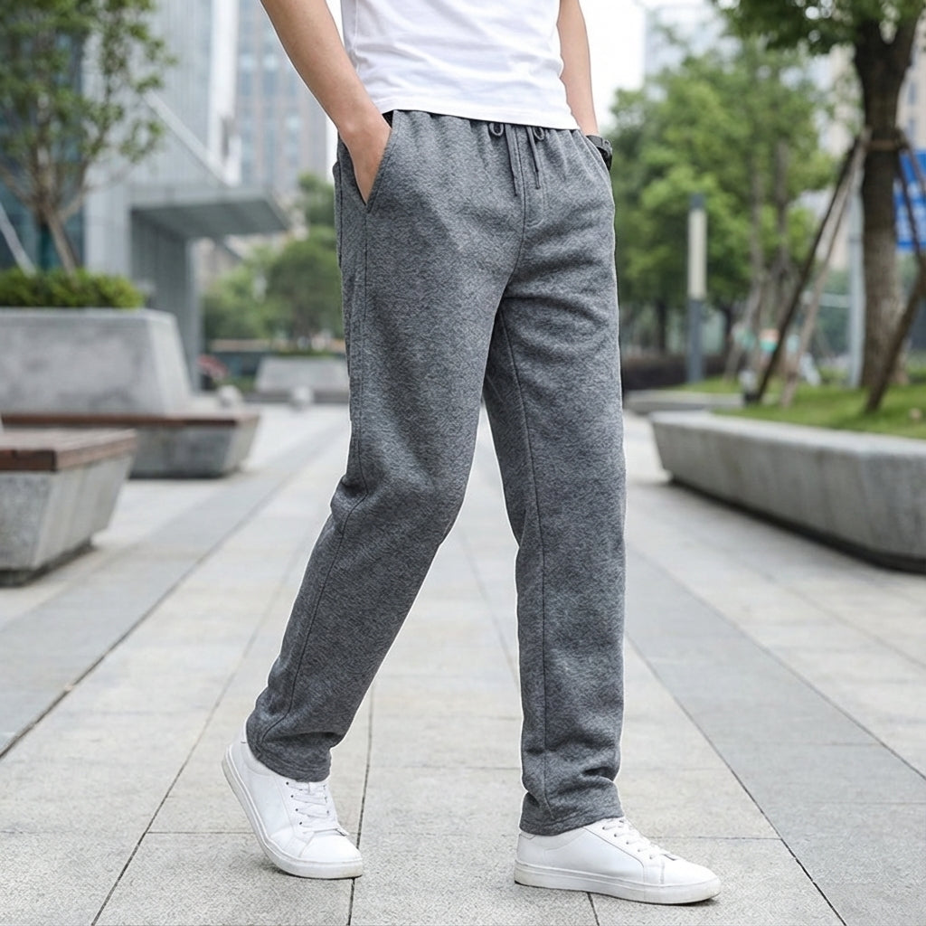 Men's tapered casual jogger pants in light grey, perfect for activewear and loungewear, front view.