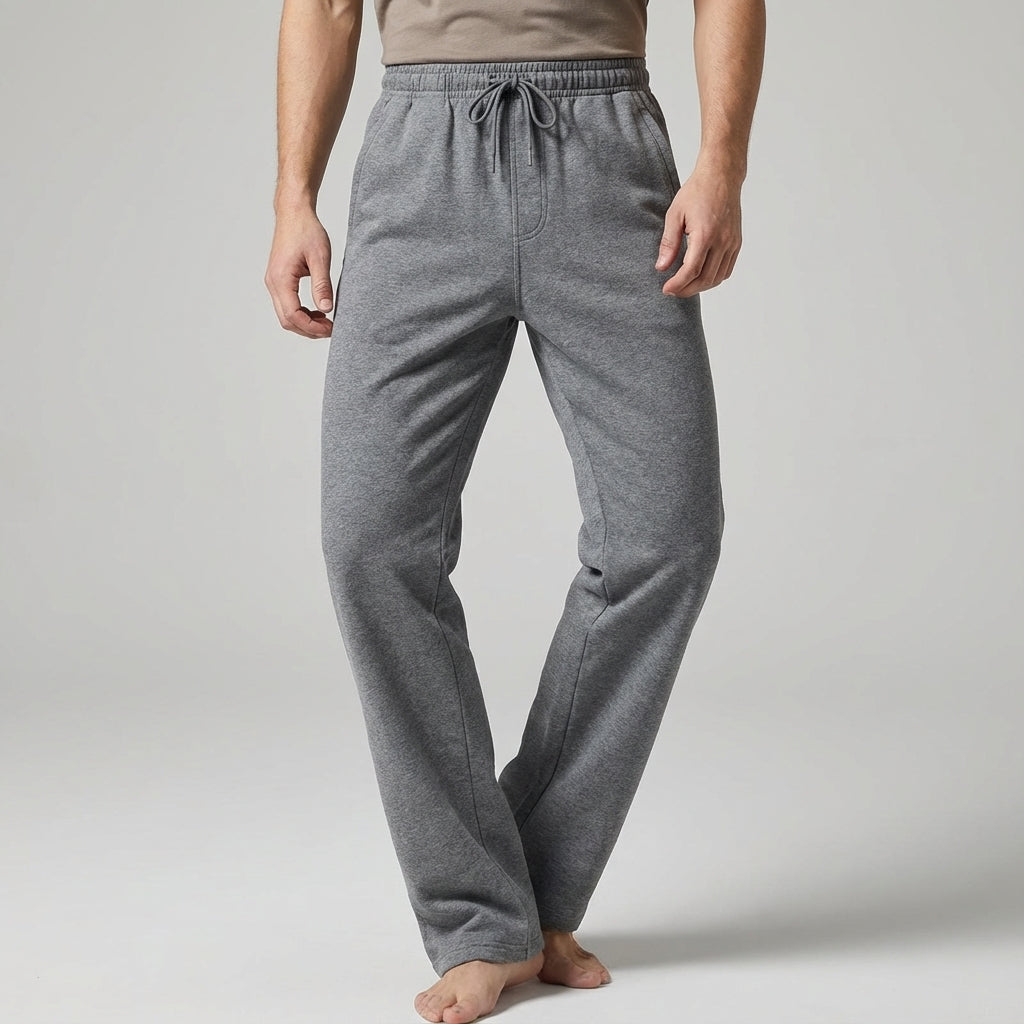 Dark blue tapered casual jogger pants for men, ideal for athletic wear and everyday comfort, side view.
