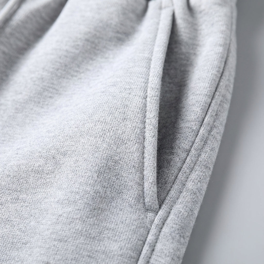 Men's black tapered jogger pants, showcasing a comfortable fit and modern style for casual or sport.