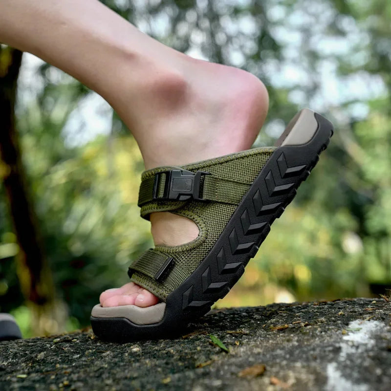 Pair of green TerraGlide men's walking sandals, offering ultimate comfort and grip for adventures.