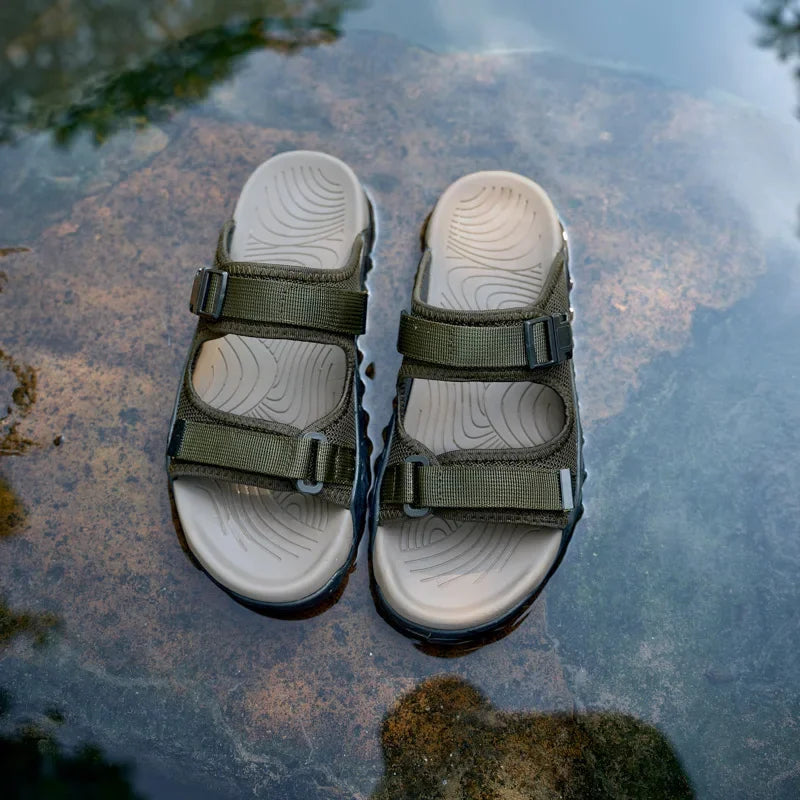 Durable, quick-drying material of TerraGlide men's adventure sandals, ready for any wet outdoor conditions.