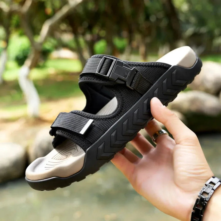 Top view of black TerraGlide men's sandals, showcasing comfortable footbed & secure adjustable fit.