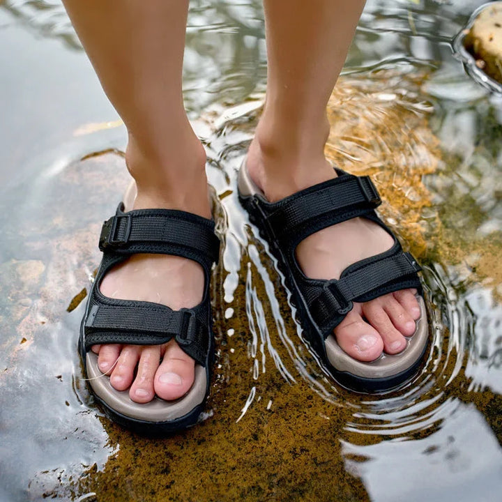 Adjustable straps on Men's TerraGlide adventure sandals ensure a secure, custom fit for summer adventures.