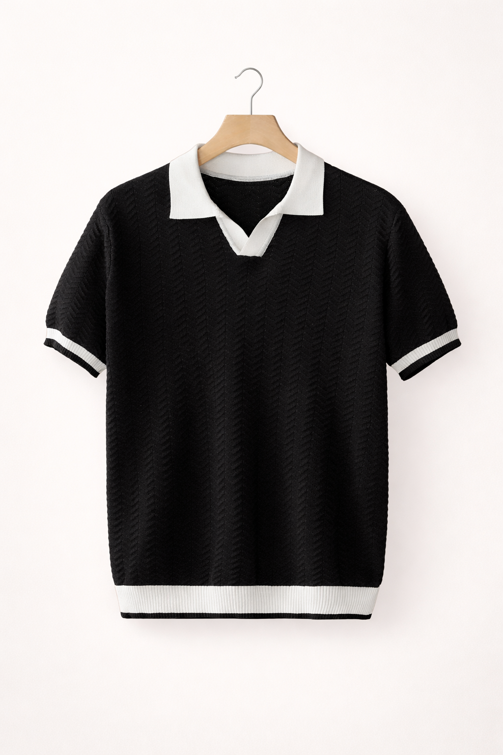Classic men's short sleeve collared polo shirt in a textured knit. Versatile for everyday casual wear.