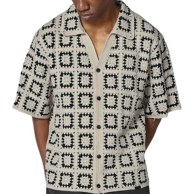 Textured men's knit shirt, short sleeve, modern fit. Versatile for smart casual or everyday summer.