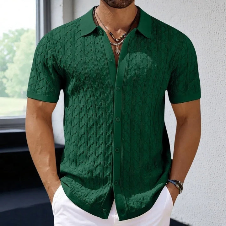 Versatile men's polo top with unique textured fabric and a sophisticated button-down collar, great for casual style.