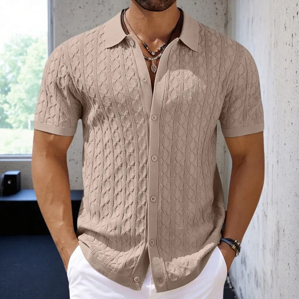 High-quality men's textured polo shirt with a button-down collar, ideal short-sleeve smart casual top for summer.