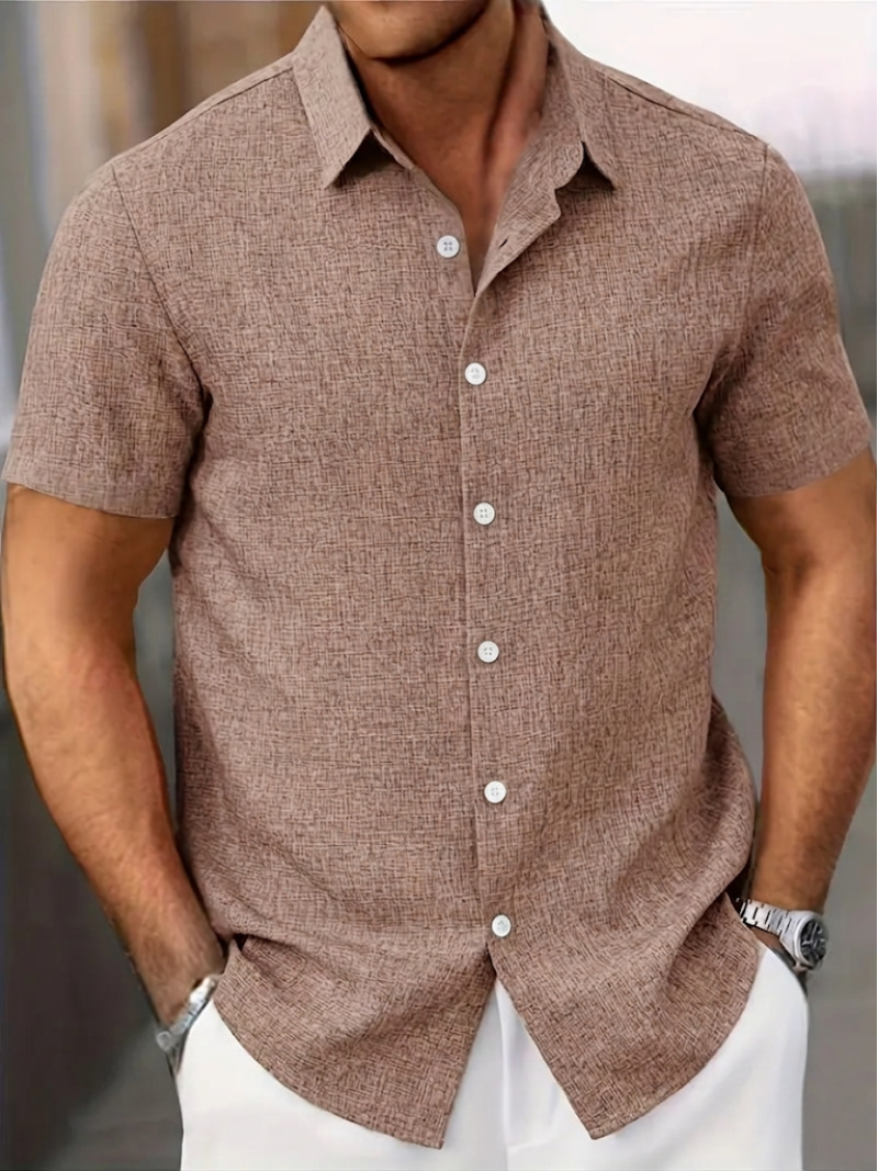 Men's regular fit polo. Button-down, textured knit, short sleeves, point collar. A versatile piece for men's fashion.
