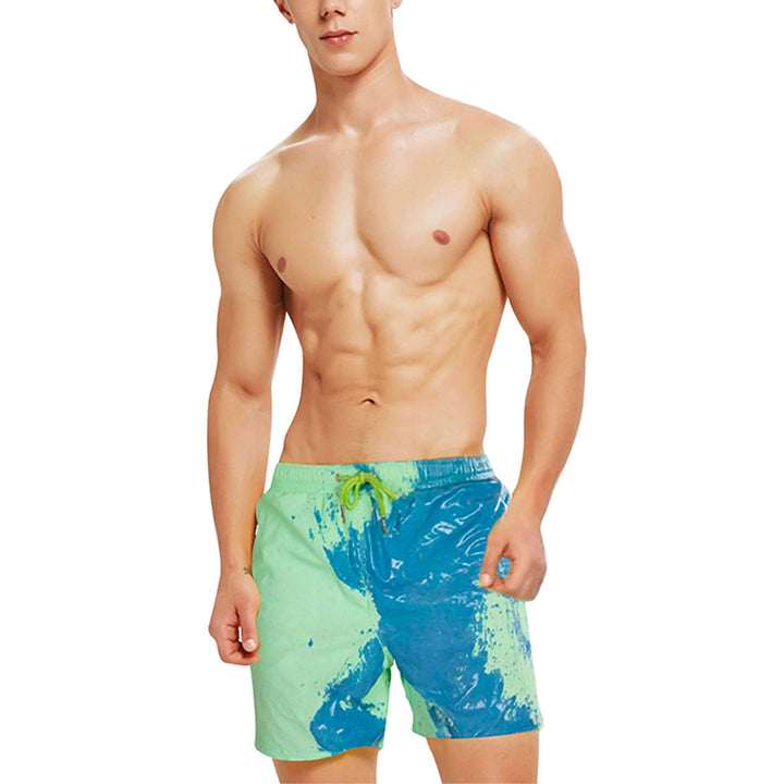 Men's thermal color-changing swim shorts in blue, red, and yellow, perfect for summer beachwear