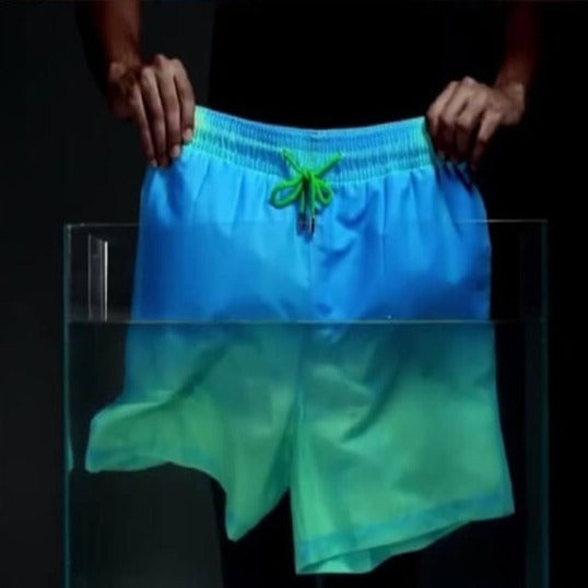 Stylish mens color-changing swim shorts, showcasing vibrant thermal reaction at the pool