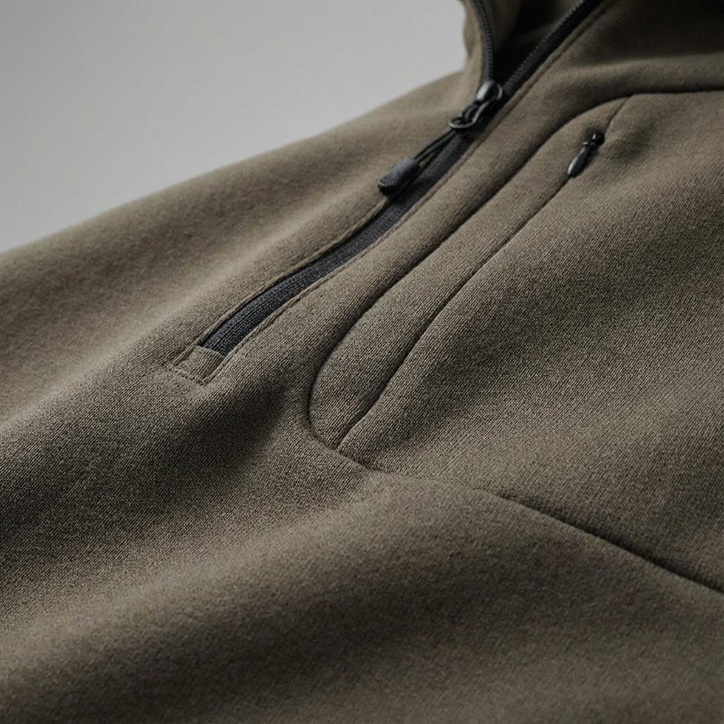 Close-up of men's thermal activewear jacket, half-zip design, perfect for cool weather training