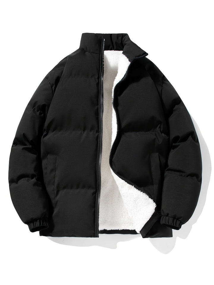 Insulated men's quilted winter coat, designed for extreme cold weather and comfort.
