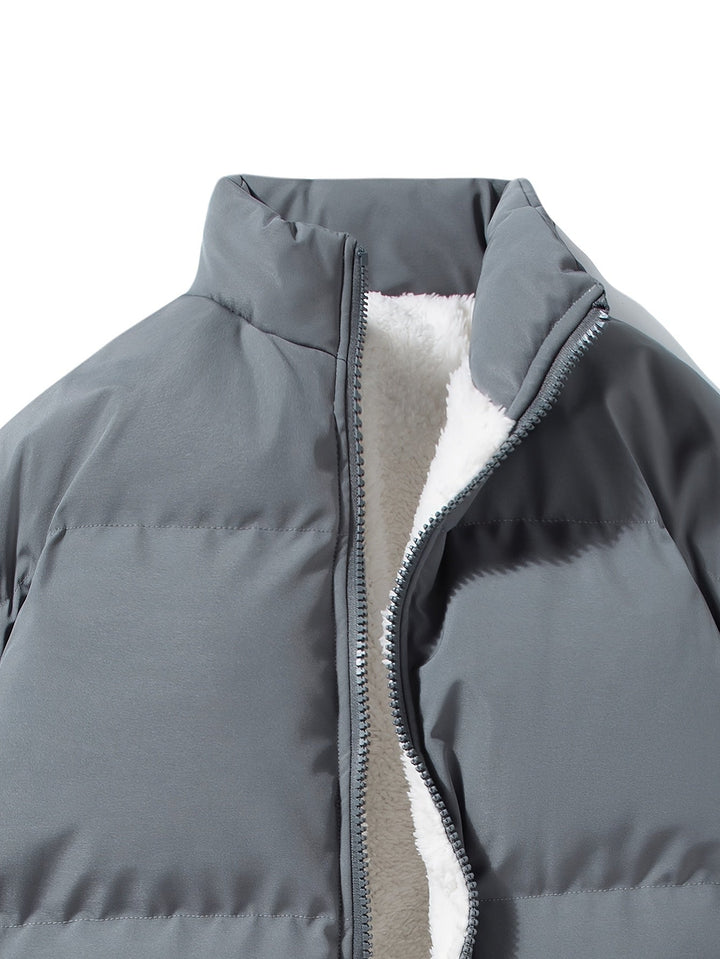 Quilted men's winter coat with thermal lining, essential for ultimate warmth and style.