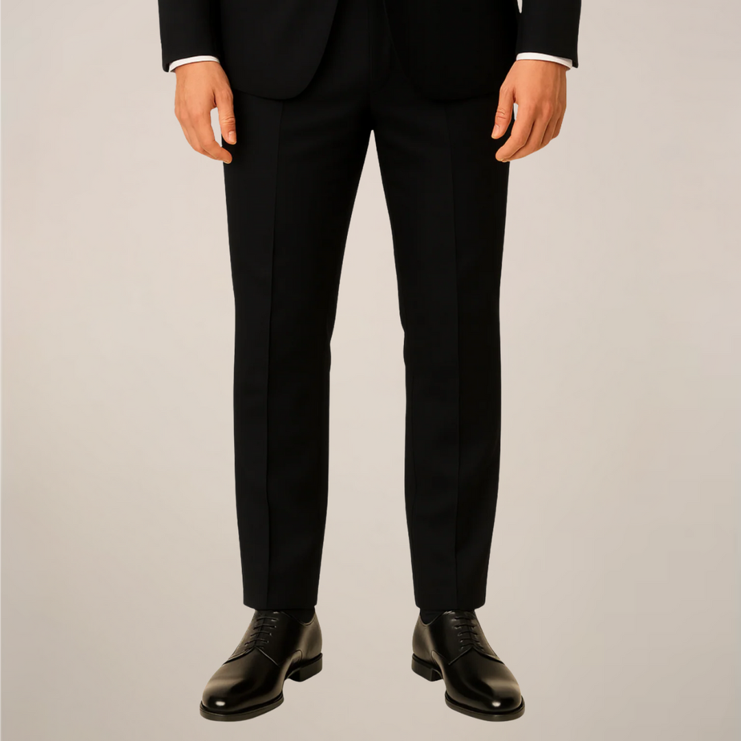Tailored fit men's three-piece dinner suit, ideal for wedding, prom, or formal black tie event. Stylish and sophisticated.