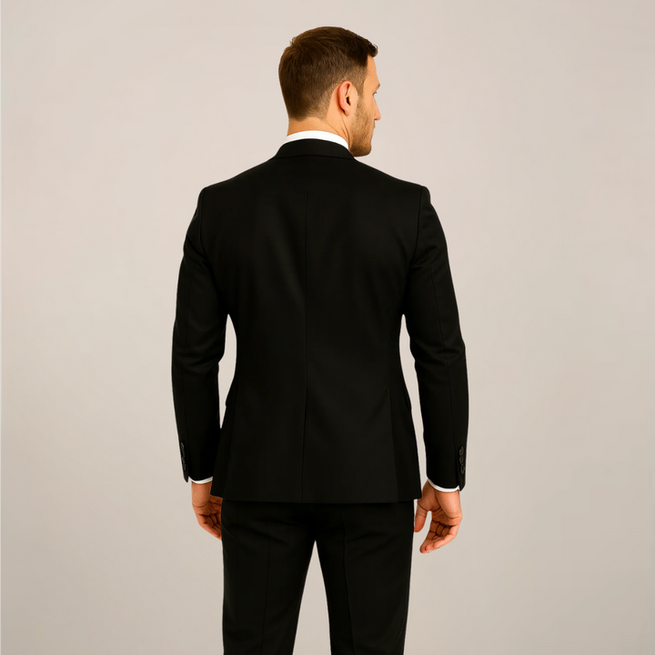 Sophisticated men's three-piece dinner suit with contrast lapel. A slim fit formal wear for weddings, prom, or black tie.