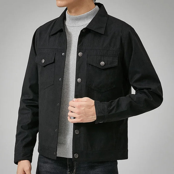 Man wearing a versatile button-front jacket, ideal for fall or spring, offering a casual & timeless look.