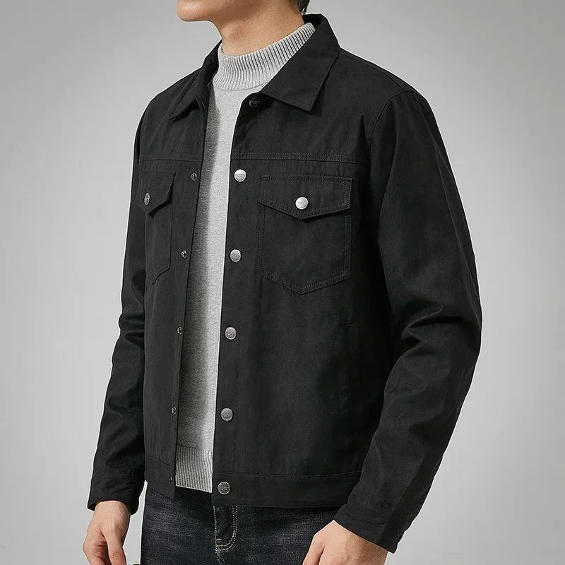 Back view of a men's classic button-front outerwear jacket, emphasizing its clean lines & timeless style.