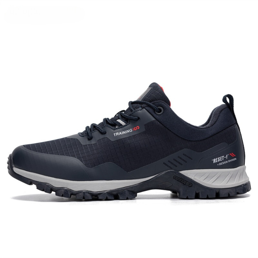 Rugged men's TrailMax waterproof hiking shoes. Built for outdoor adventure, featuring durable materials & non-slip sole.