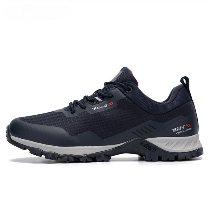 Rugged men's TrailMax waterproof hiking shoes. Built for outdoor adventure, featuring durable materials & non-slip sole.