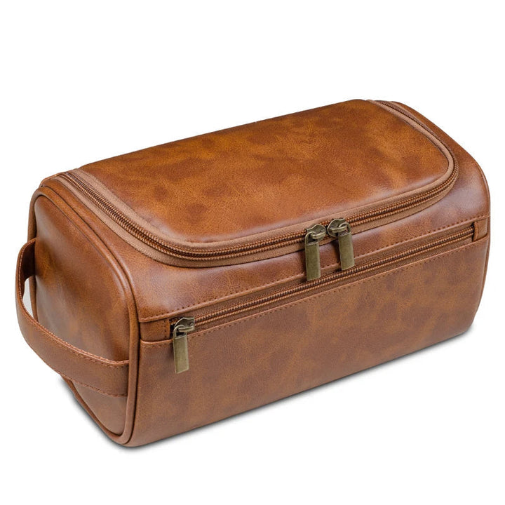 Convenient men's travel toiletry bag. Waterproof interior keeps grooming essentials safe & dry.
