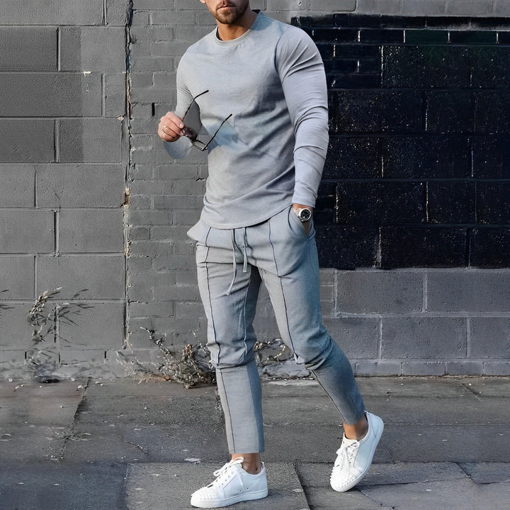 Men's casual fashion set: modern sweater & comfortable joggers. Perfect matching outfit for stylish loungewear.