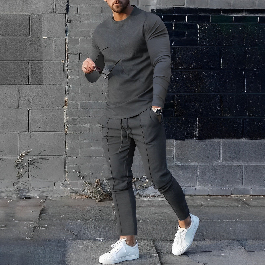 Men's fashion 2-piece set: sleek sweater and trendy joggers. Comfortable and stylish for activewear or casual outfits.