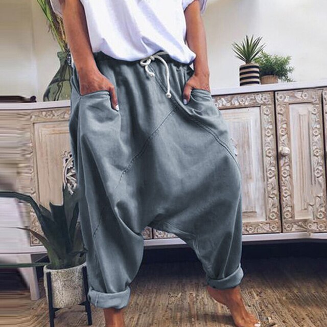 Stylish men's bohemian harem trousers with unique design, perfect for fashion-forward casual menswear.