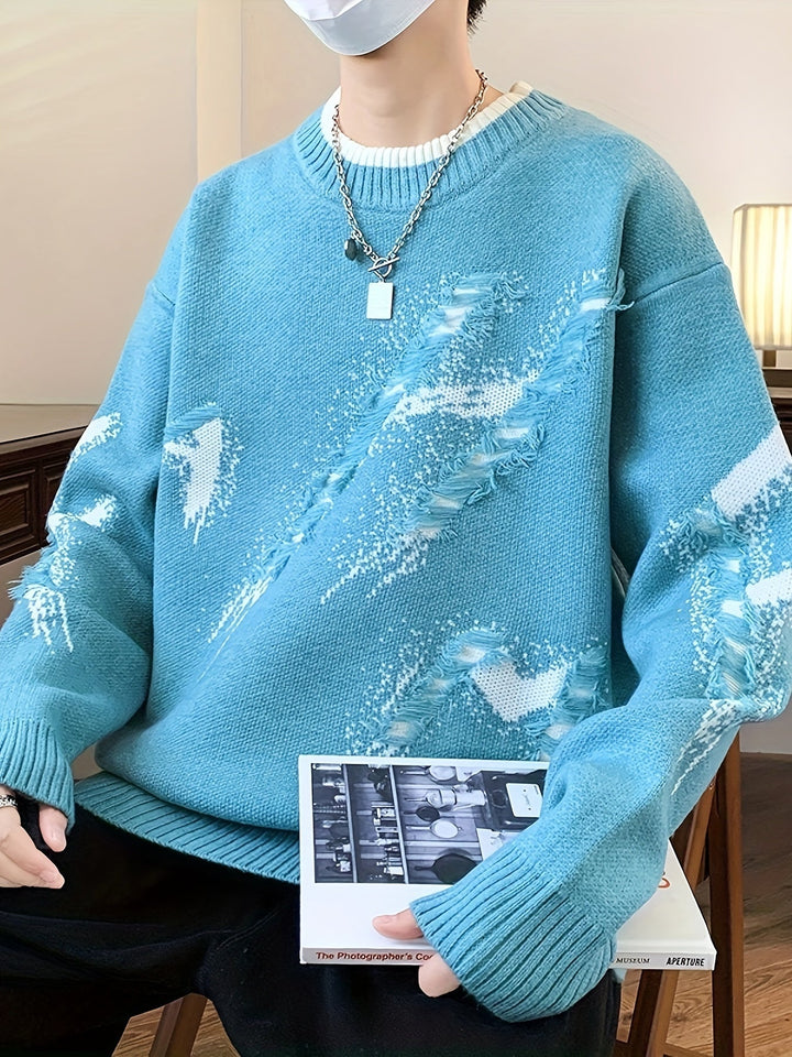 Men's trendy oversized sweater with stylish frayed edges. Perfect for a casual, relaxed look in winter.