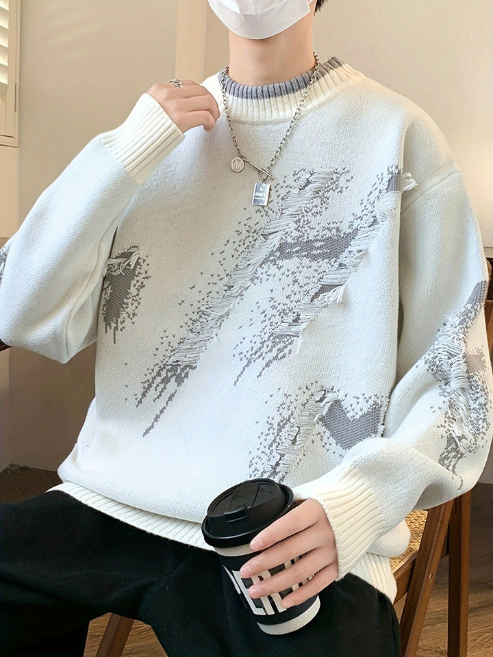 Fashionable men's oversized knit sweater, offering a trendy design with unique frayed details for cold weather.