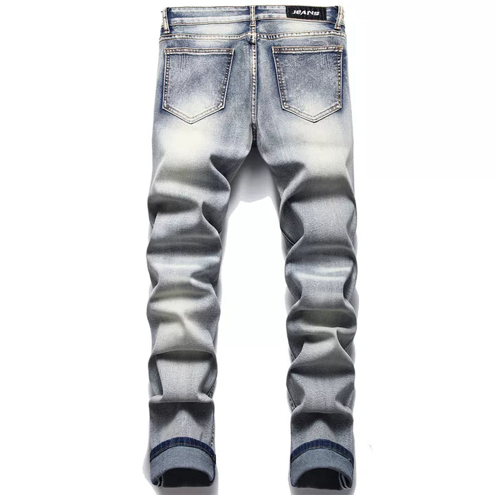 Comfortable men's ripped jeans, modern fit denim pants ideal for casual everyday wear and street style.
