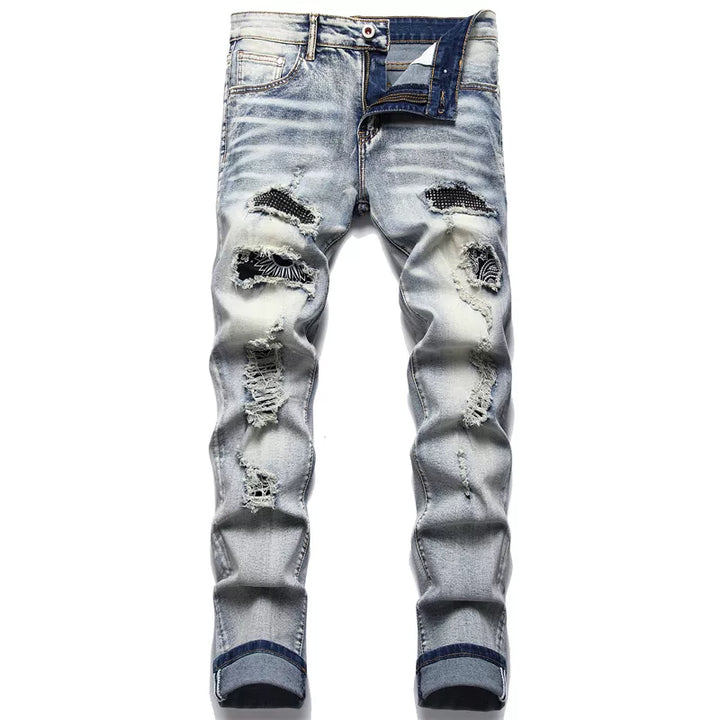 Trendy blue men's ripped jeans, modern fit distressed denim designed for a stylish and contemporary urban look.
