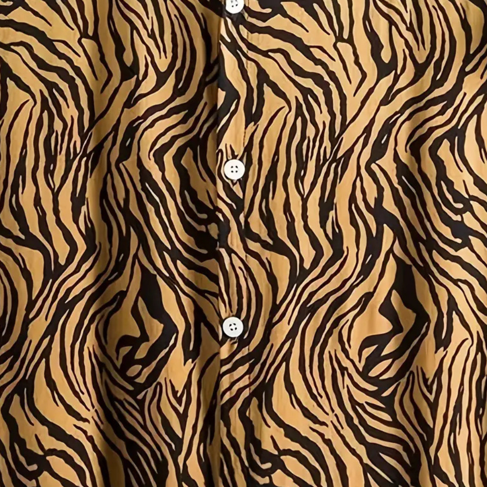 Eye-catching men's tiger print button-up shirt. Trendy design for a bold fashion statement and casual wear.
