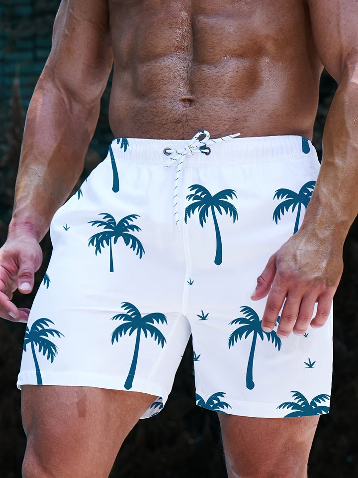 Stylish men's quick-dry swim shorts featuring a vibrant green palm print, ideal surf shorts