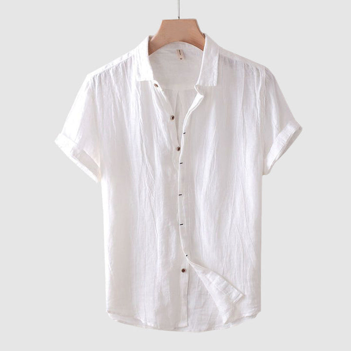 Relaxed fit men's summer shirt, breezy comfort, short sleeve button-up top ideal for warm weather.