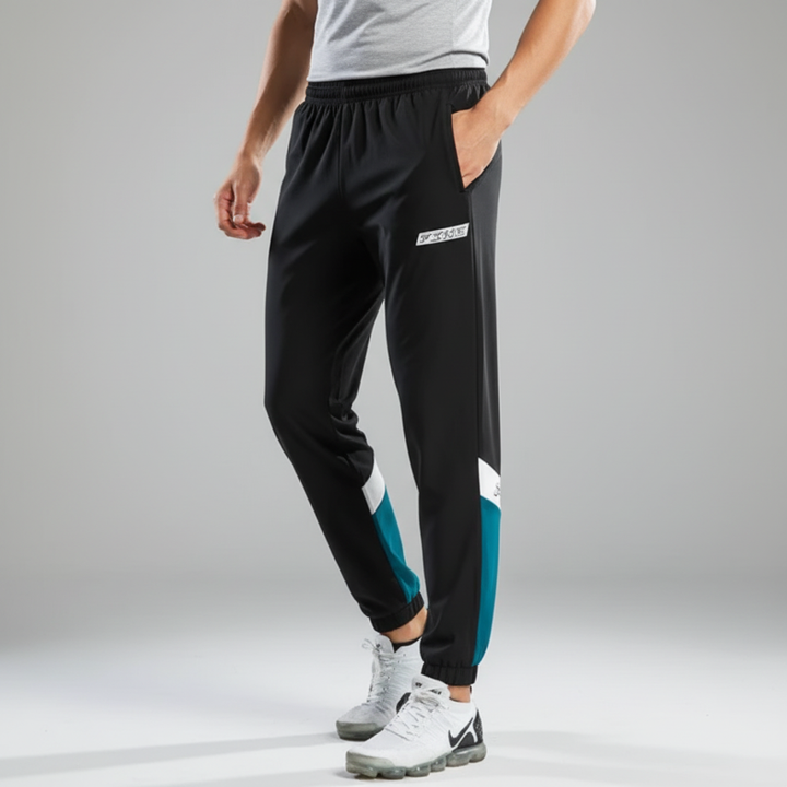 Athletic men's color block joggers and jacket set. Perfect activewear for training, gym, or casual wear.
