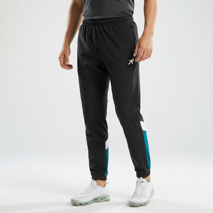 Men's two-piece color block training pants and top set. Ideal activewear for sport, gym, and jogging.
