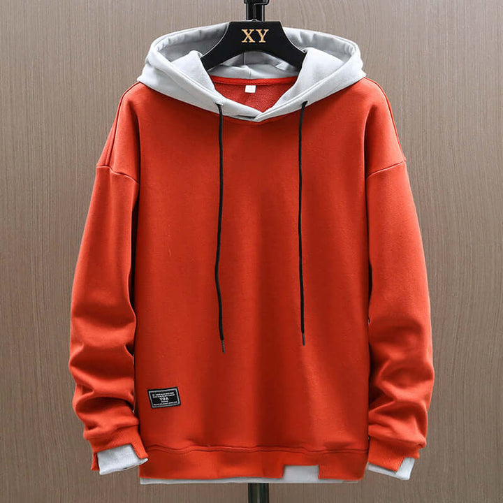 Men's two-tone colorblock hoodie, a modern and comfortable pullover for casual everyday wear.