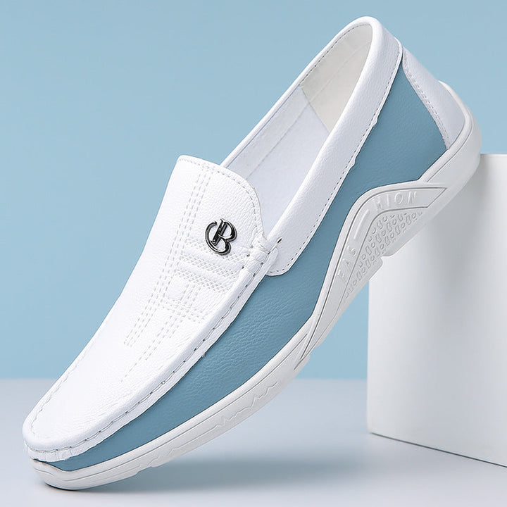 Men's two-tone slip-on loafers, combining comfort & modern style for everyday wear.