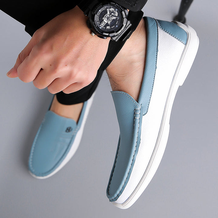 Relaxed fit men's two-tone slip-on loafers, designed for all-day comfort and style.