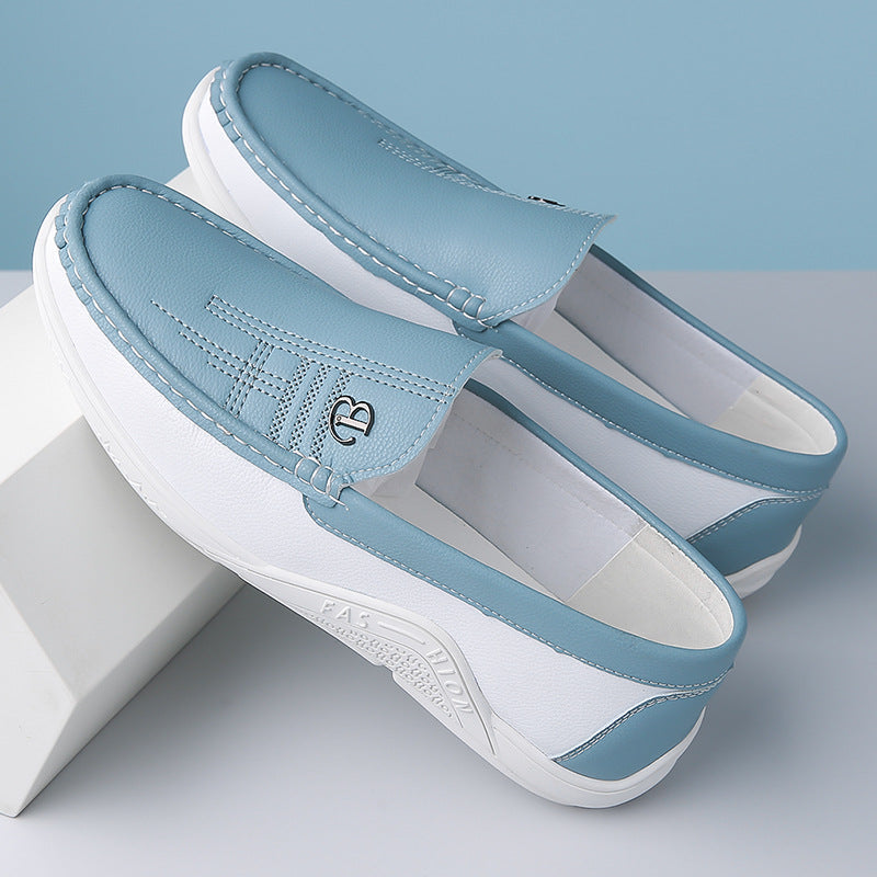 Dynamic men's two-tone slip-on loafers, perfect for adding a pop of color to outfits.