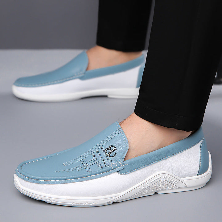 Durable men's two-tone slip-on loafers, built for long-lasting wear and sophisticated style.