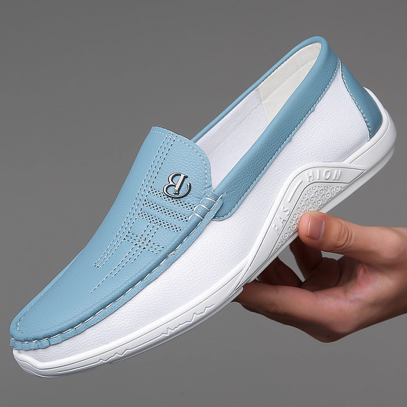 Detail shot: Men's two-tone slip-on loafers showcasing the contrasting color design.